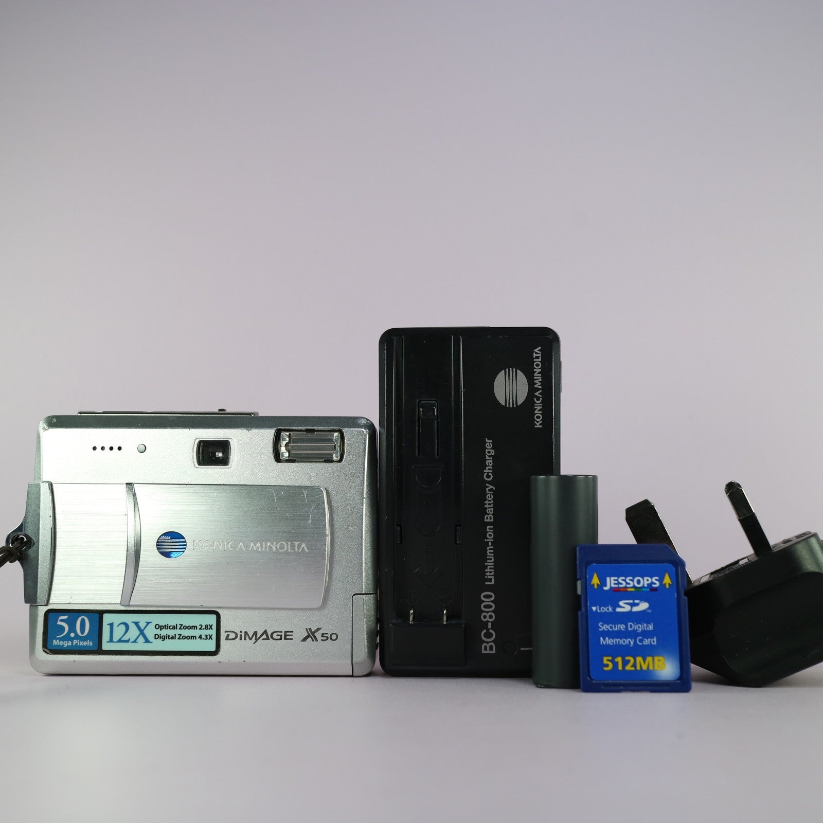 Konica Minolta Digital Camera Dimage X50 5.0MP Silver Tested Full Working Set