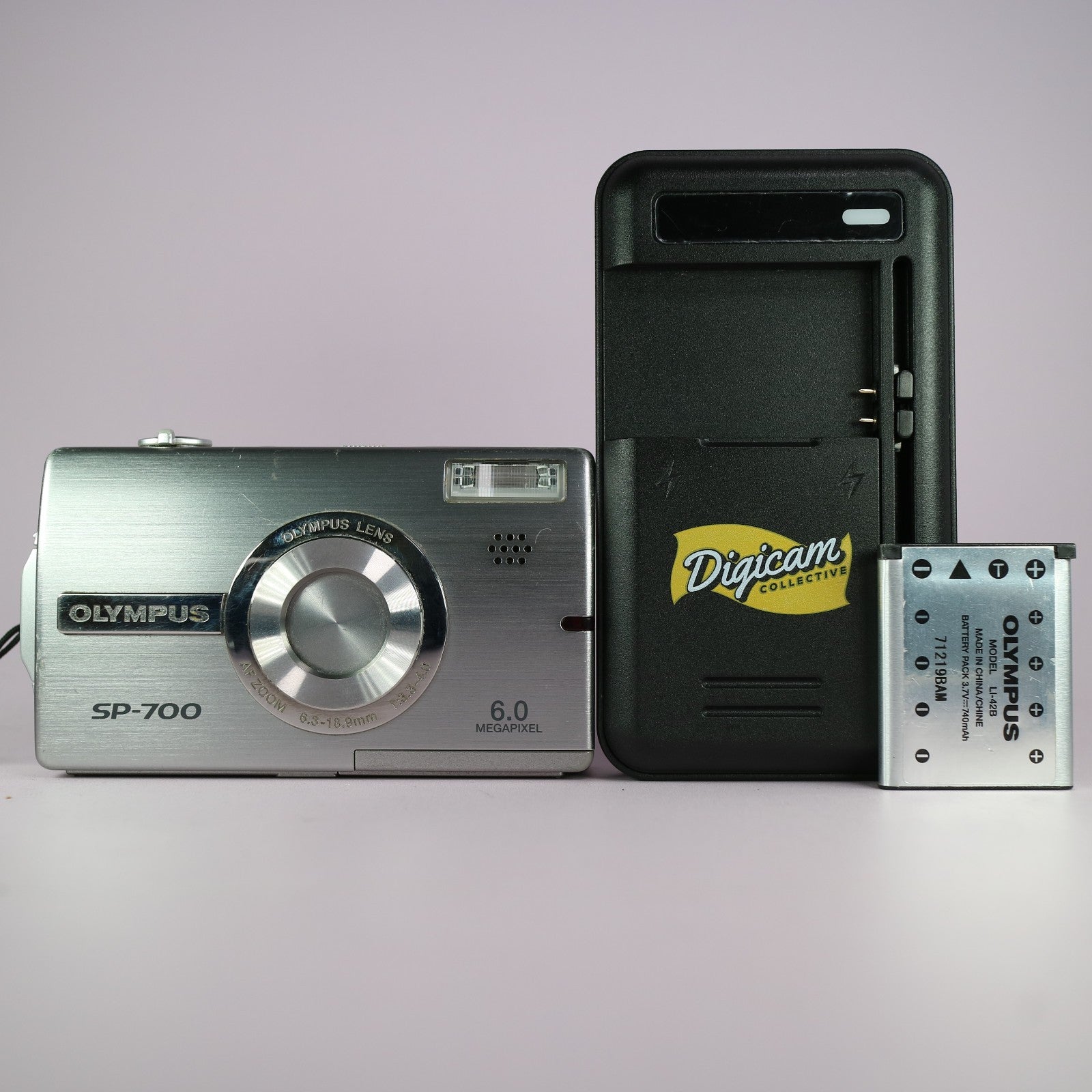Olympus Digital Camera SP-700 6.0MP Silver Tested w/ Battery and Charger