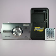 Olympus Digital Camera SP-700 6.0MP Silver Tested w/ Battery and Charger