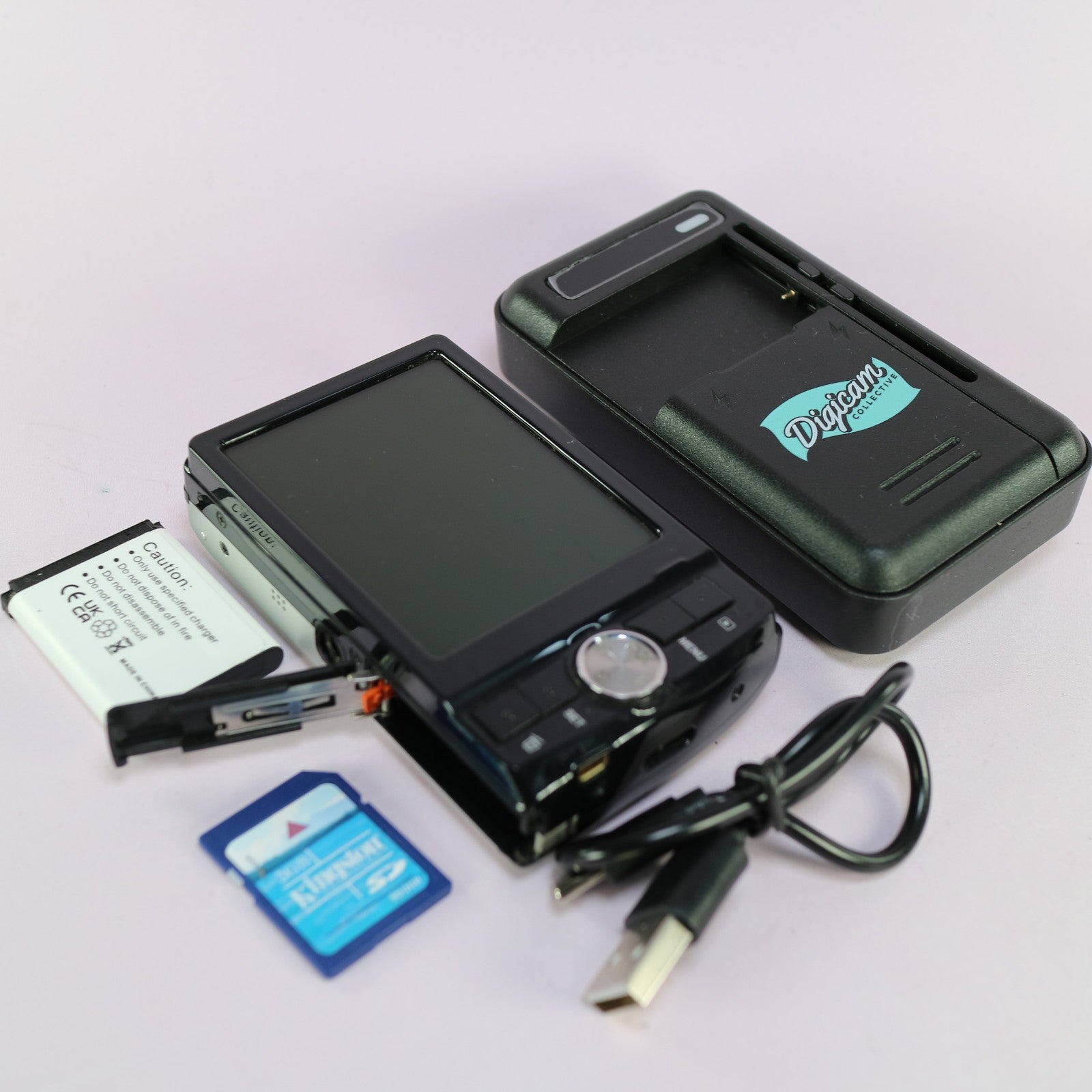 Traveler Digital Camera XS 40 10.0MP Black Tested Full Working Set