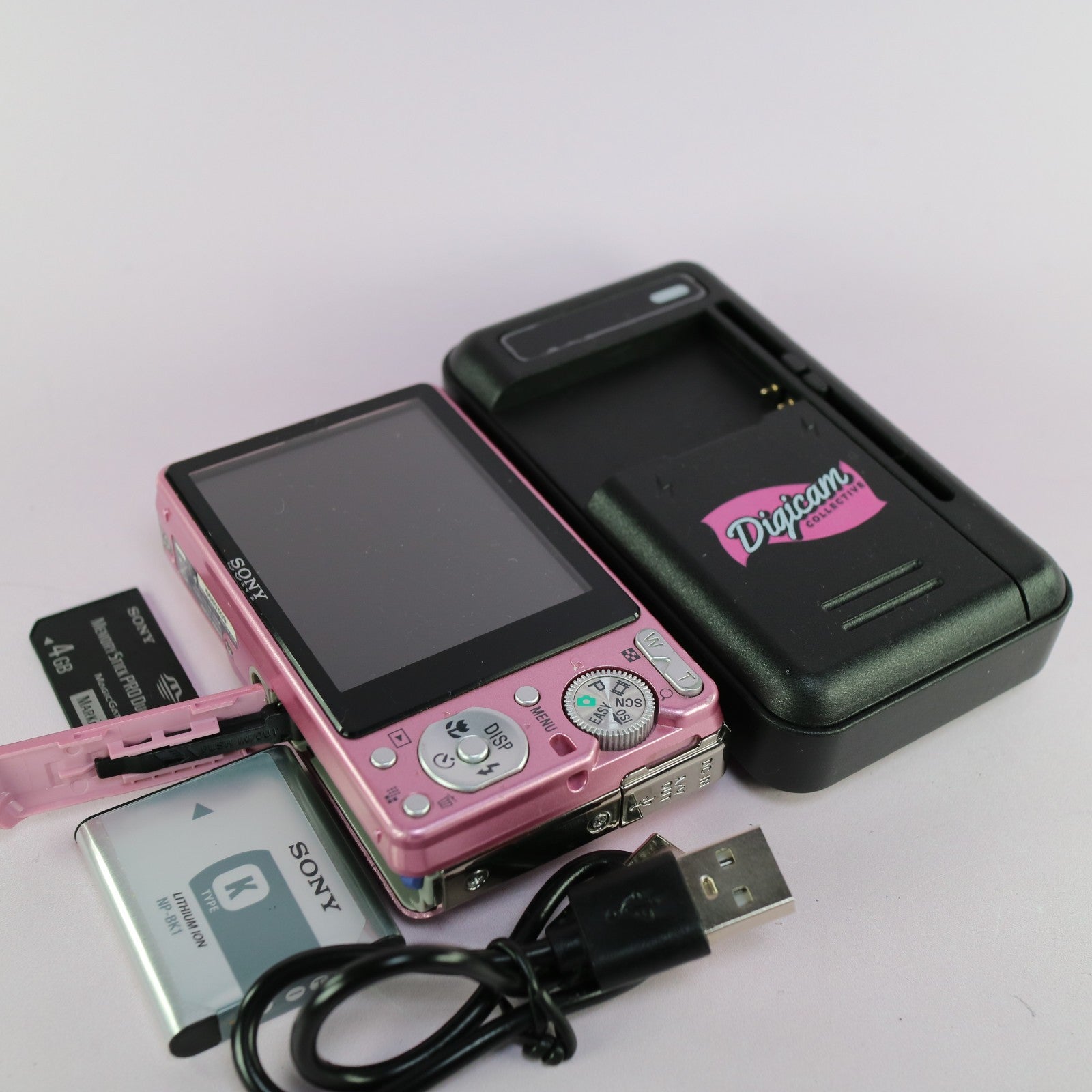 Sony Digital Camera Cybershot DSC-S980 12.1MP Pink Tested Full Working Set