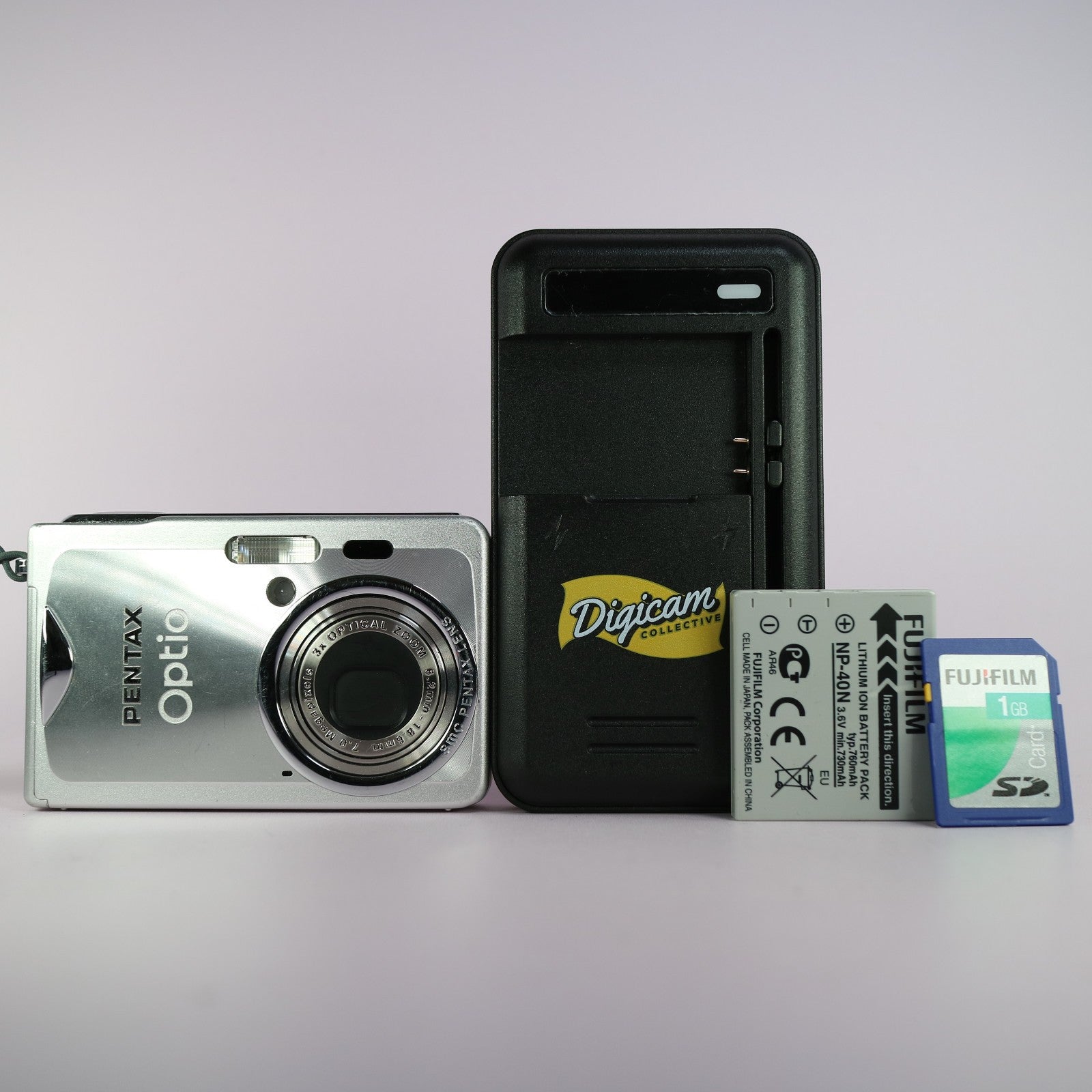Pentax Digital Camera Optio S7 7.0MP Silver Tested Full Working Set