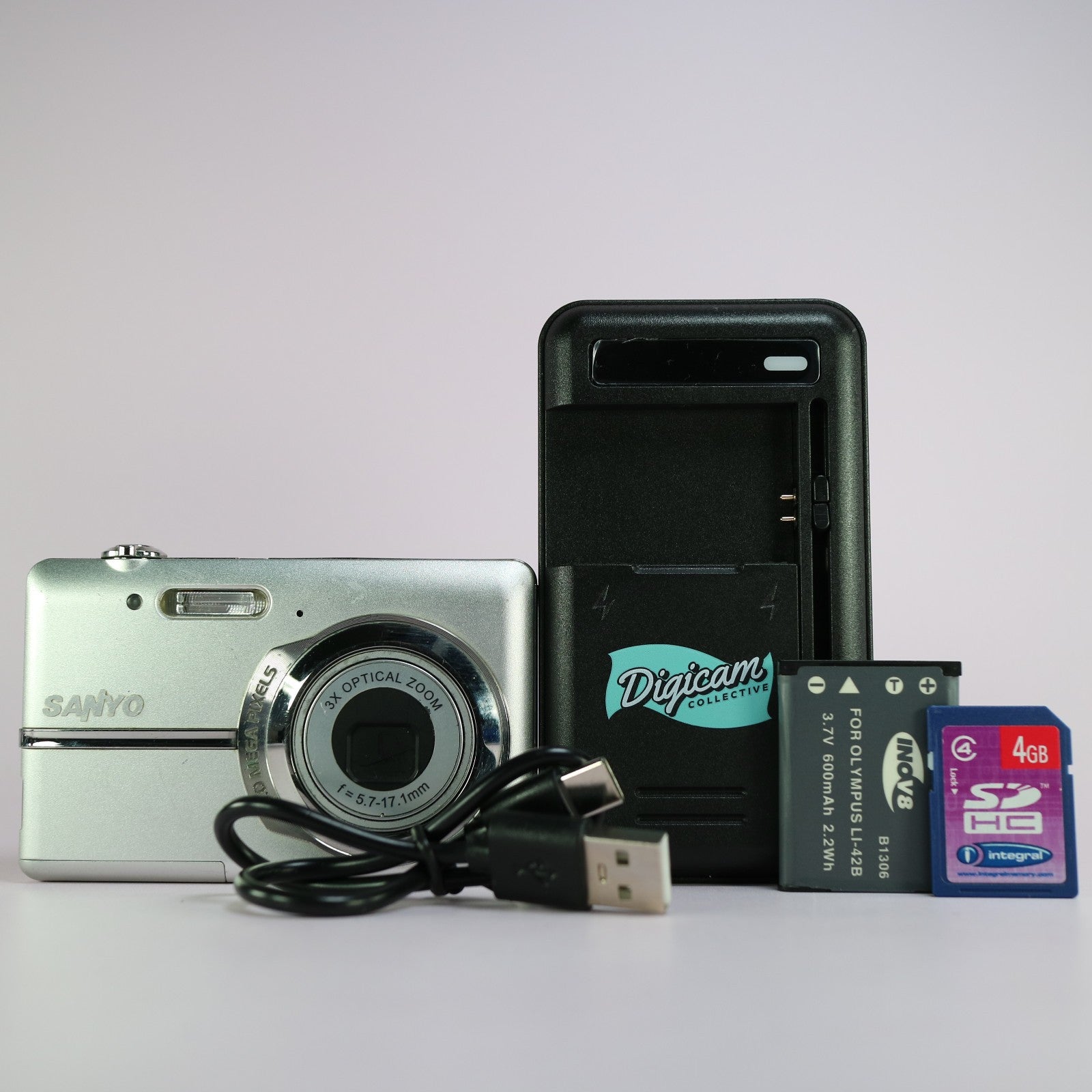 Sanyo VPC-T1060 10.0MP Compact Digital Camera Silver Tested Full Working Set