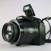 Nikon Digital Bridge Camera Coolpix P90 12.1MP Black Tested Full Working Set