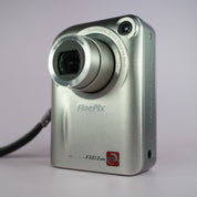Fujifilm Digital Camera FinePix F601 3.1MP Silver Tested W/ Battery + Charger