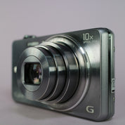 Sony Digital Camera Cybershot DSC-WX100 18.2MP Silver Tested Full Working Set