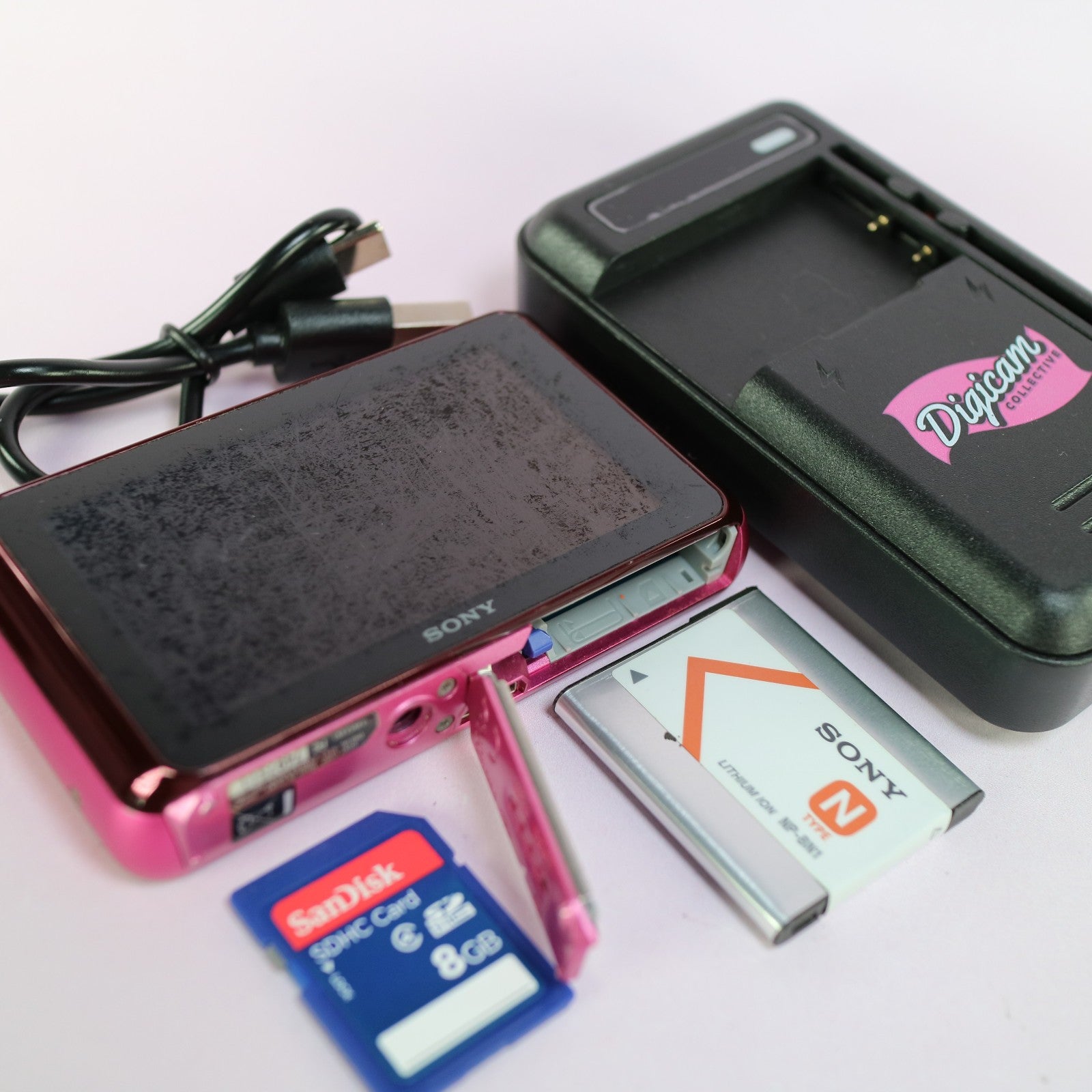 Sony Cyber-shot Underwater Digital Camera DSC-T99 14.1MP Pink Tested Full Set