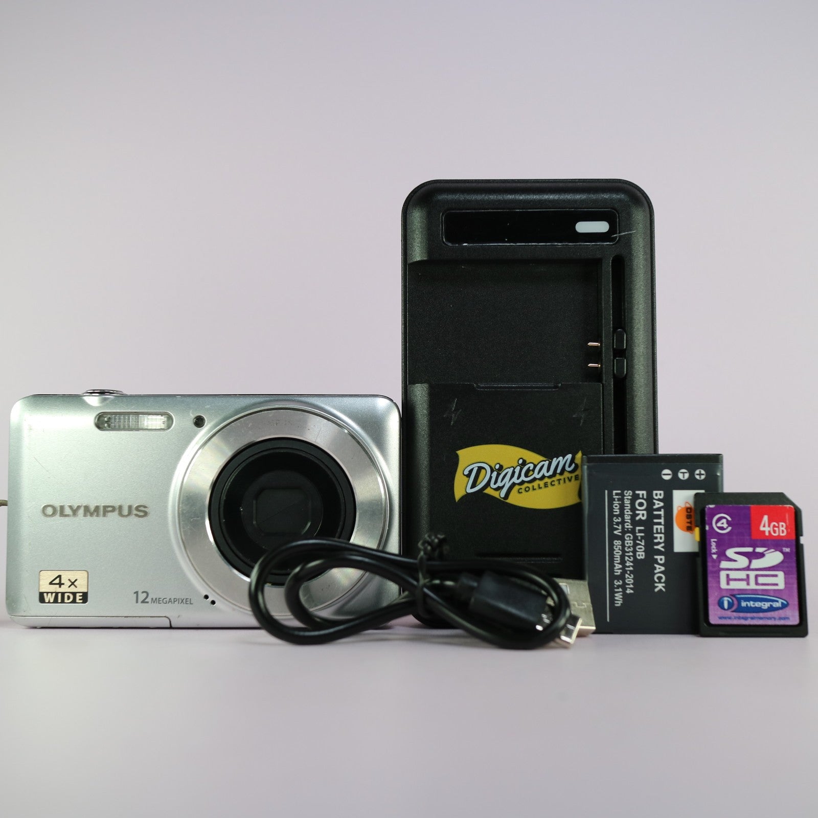 Olympus Digital Camera D-700 12.0MP Silver Tested Full Working Set