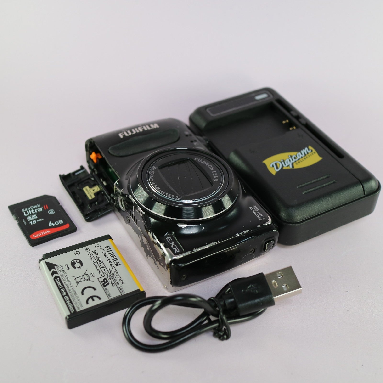 Fujifilm Digital Camera FinePix F660 EXR 16.0MP Black Tested Full Working Set