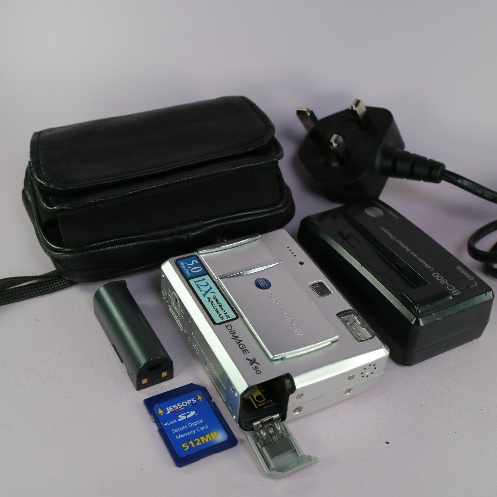 Konica Minolta Digital Camera Dimage X50 5.0MP Silver Tested Full Working Set