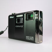 Nikon Coolpix S1000pj 12.1MP CCD Compact Projector Digital Camera