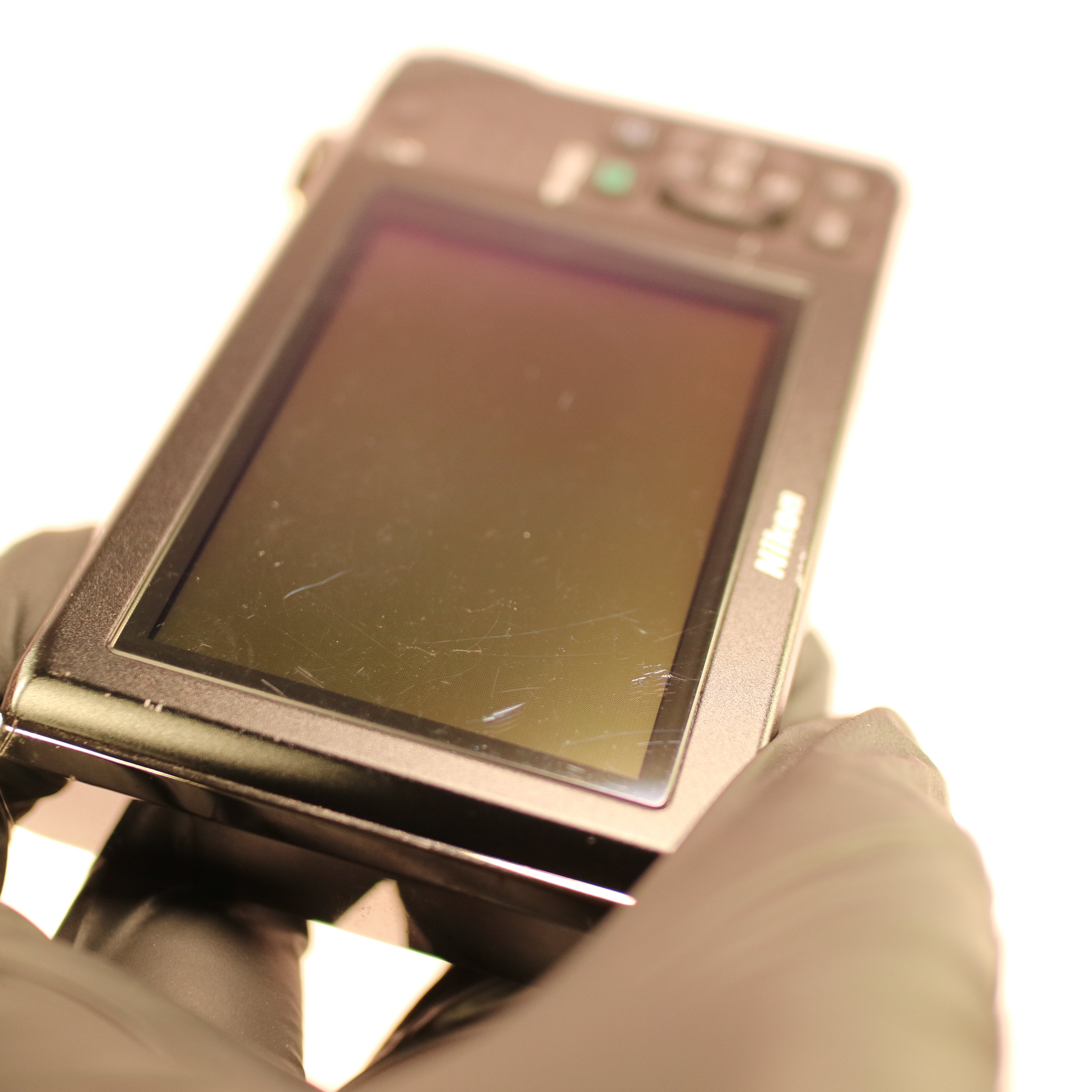 Nikon Coolpix S1000pj 12.1MP CCD Compact Projector Digital Camera